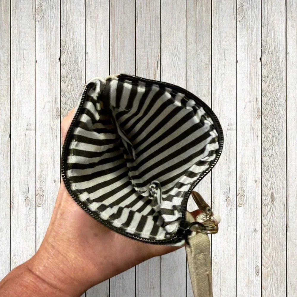 white + black striped coin purse with zipper